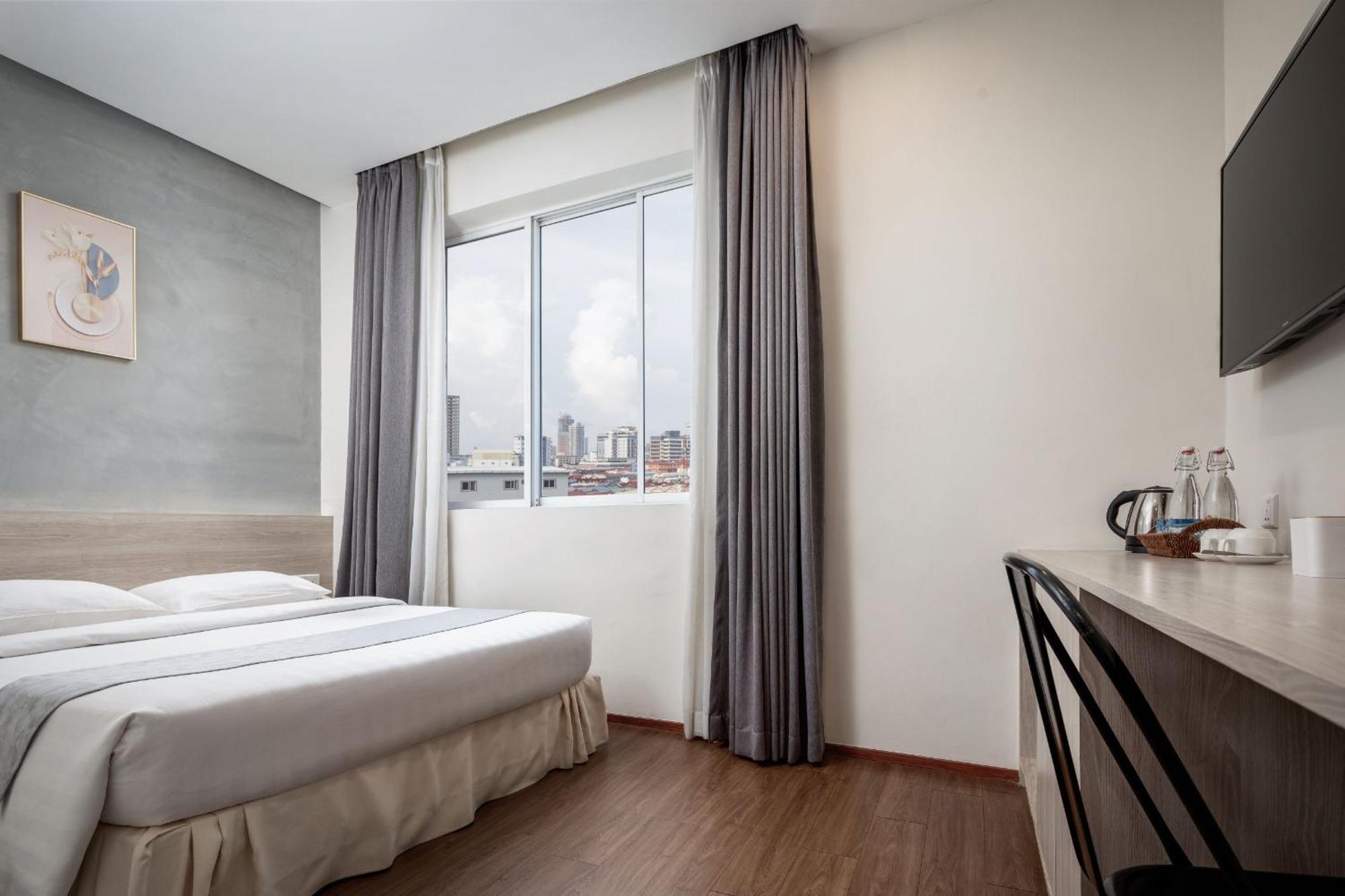 Joli Hotel Phnom-Penh Buitenkant foto